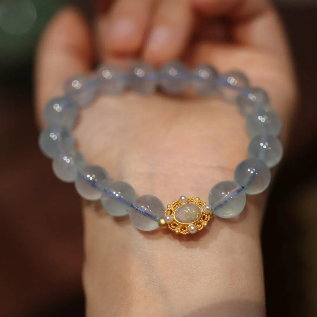 Aquamarine DIY bracelet for women with Fengjiu fox charm, showing pearl and crystal design options.