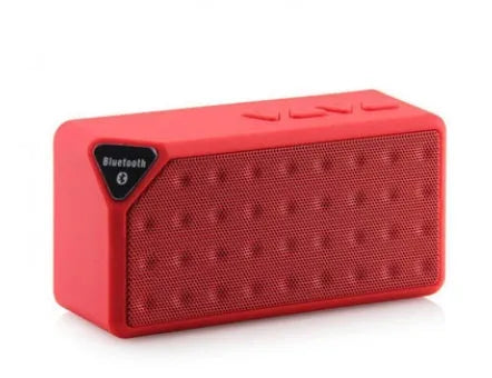 Cannon X3 small cube-shaped wireless Bluetooth speaker in chosen colour on a surface