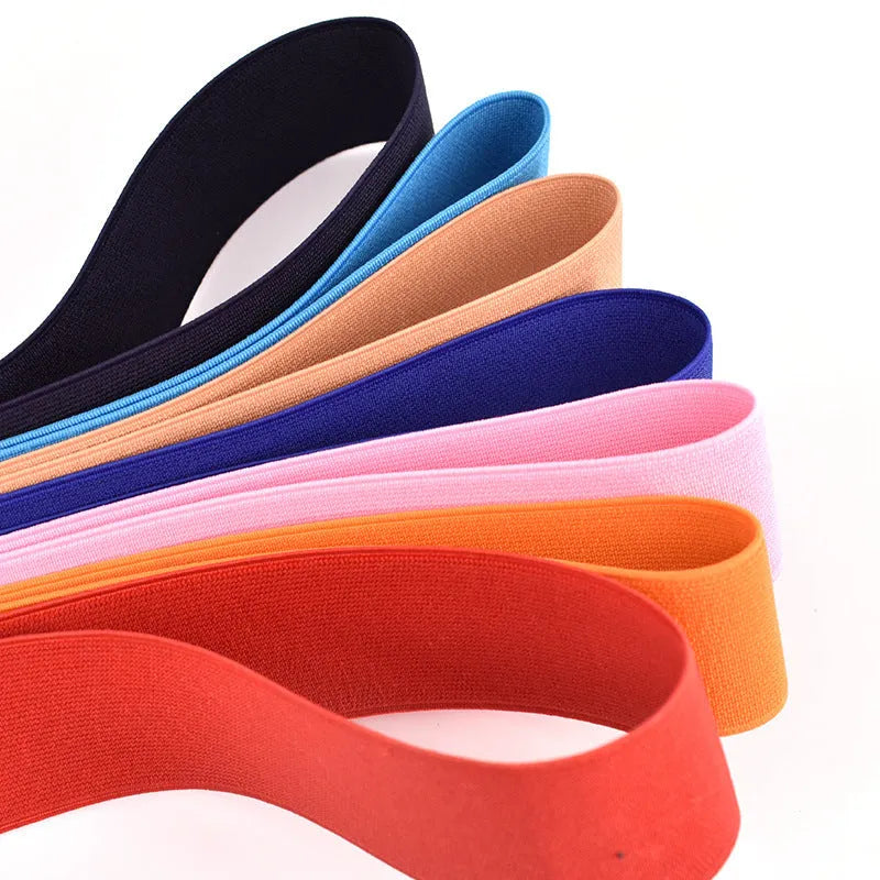 5cm wide rubber elastic band in multiple colours showing 1.5mm thickness for clothing and luggage use