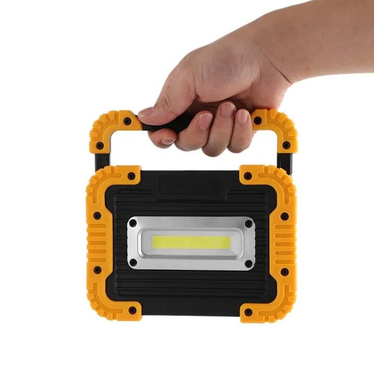 Rechargeable LED camping lantern with 750 lumens COB light, 3600mAh battery, USB output, and 180° rotatable support in rectangle style