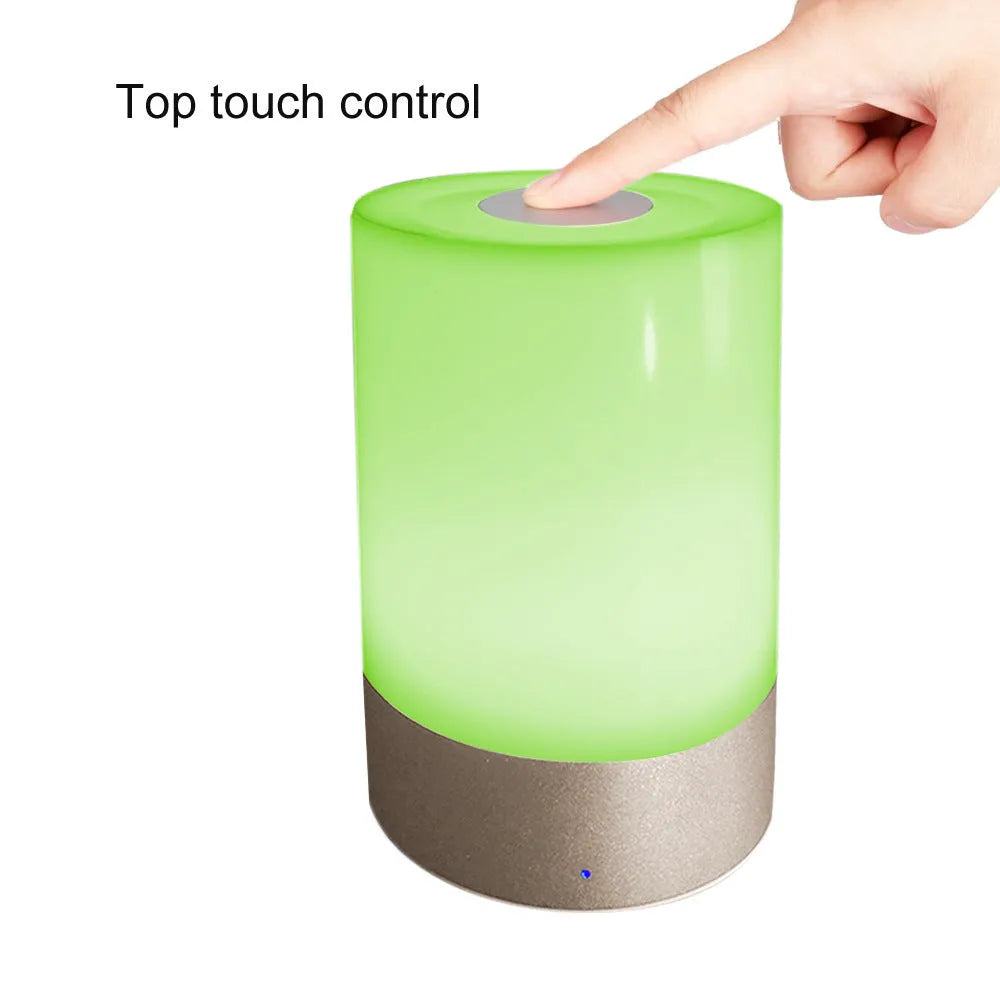 Creative Home dimmable LED bedside night light with PC plastic body on a wooden desk
