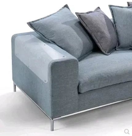 Two transparent PVC self-adhesive cat claw protector pads on a leather sofa arm, each 47x15cm