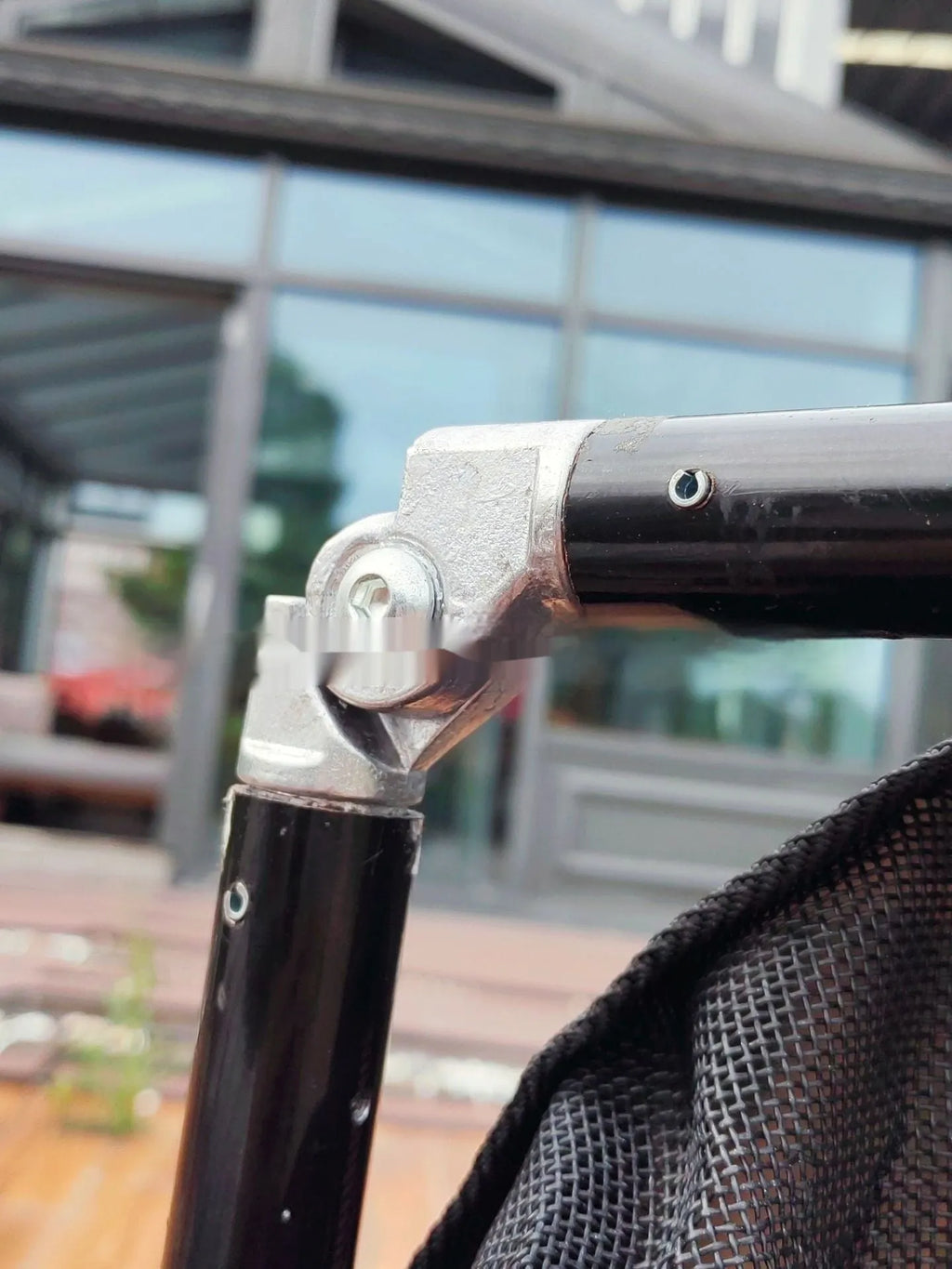 Black aluminium alloy foldable pet stretcher for large dog emergency transport.