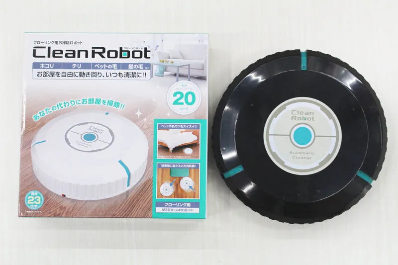 Black or white AC automatic sweeping robot vacuum cleaner on a hard floor.