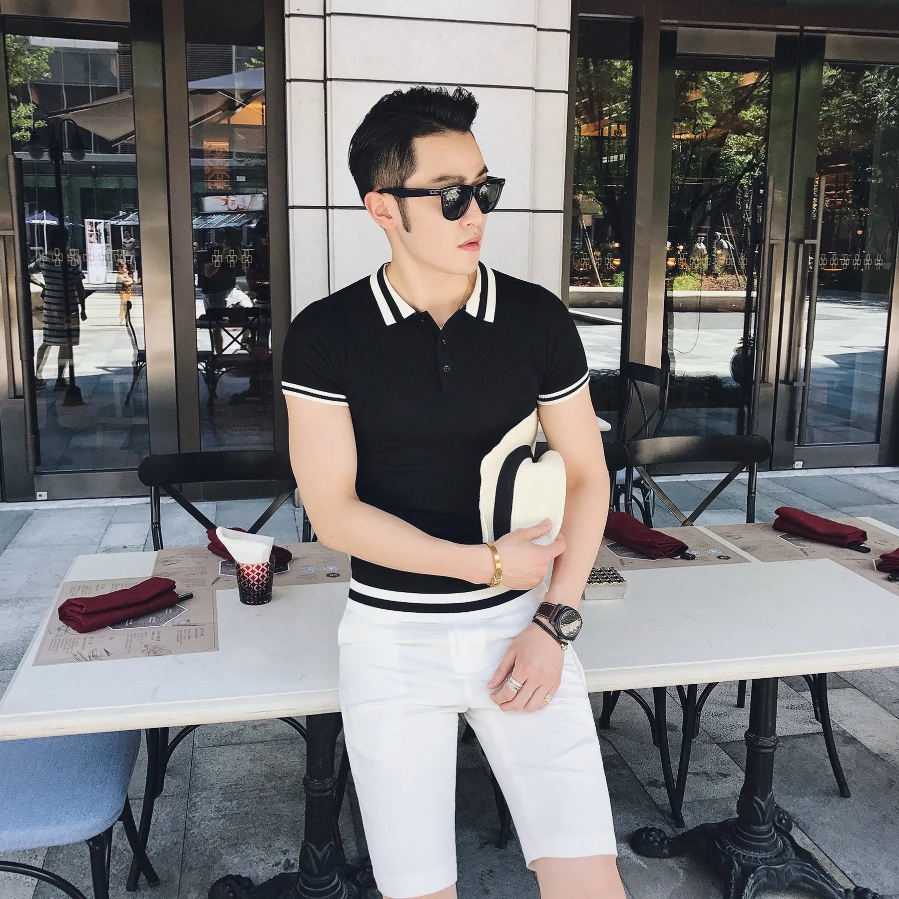 Men's slim fit short sleeve casual polo shirt in black front view