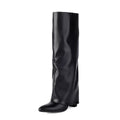 Women's plus size thick high heel boots in black with sewing line detailing and high cylinder design
