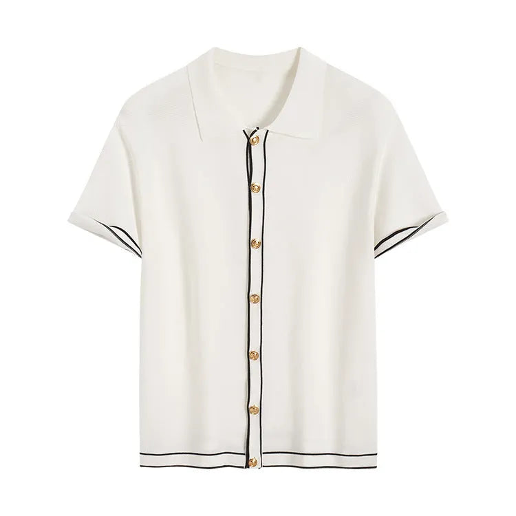 White short-sleeve cardigan with dark contrast colour lapels, laid flat to show front button detail.
