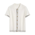 White short-sleeve cardigan with dark contrast colour lapels, laid flat to show front button detail.