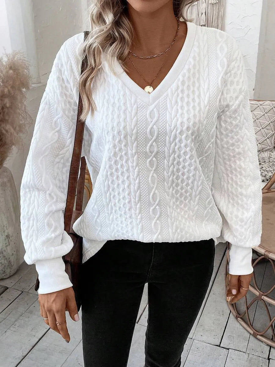 Loose fit milky white long sleeve T-shirt with casual styling and 3D pattern detailing