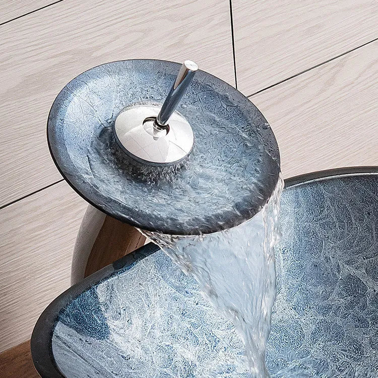 Blue grey foil tempered glass table basin for bathroom installation on a vanity unit.