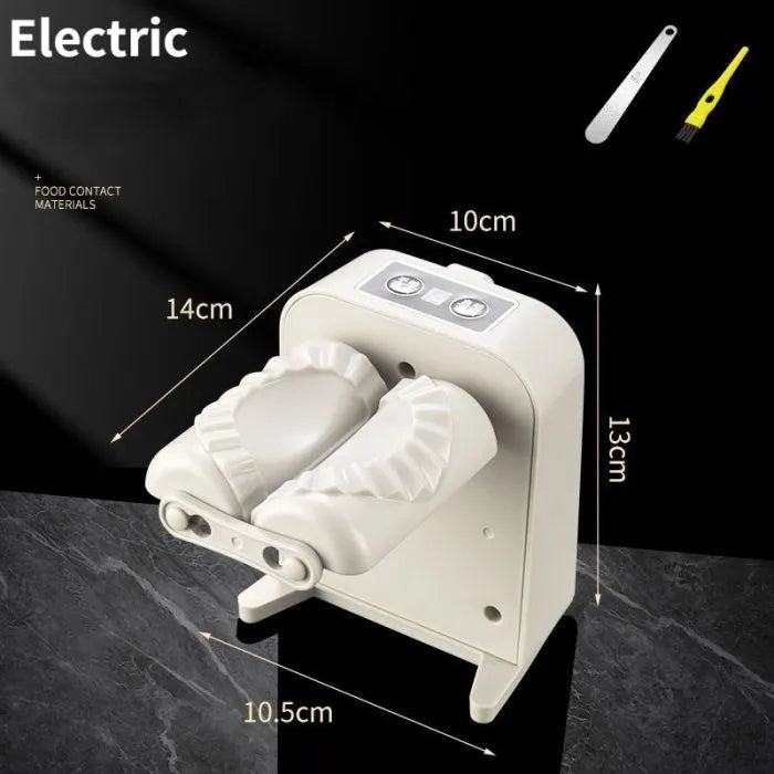 White automatic electric dumpling maker machine with USB cable, brush, and spoon on a kitchen counter.