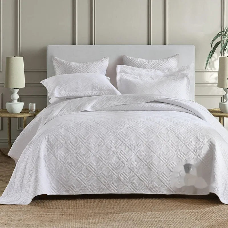 Double-sided pure cotton bed cover three-piece set in a light grey damascus pattern on a bed.