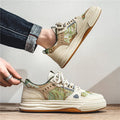 Men's flat heel canvas casual shoes in Milan green and beige colours, showing round toe design.