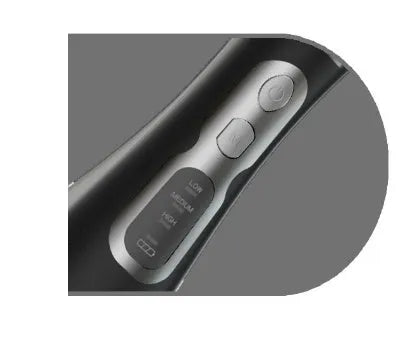 Portable oral irrigator in black, pink or white with rotating nozzle and USB charging cable