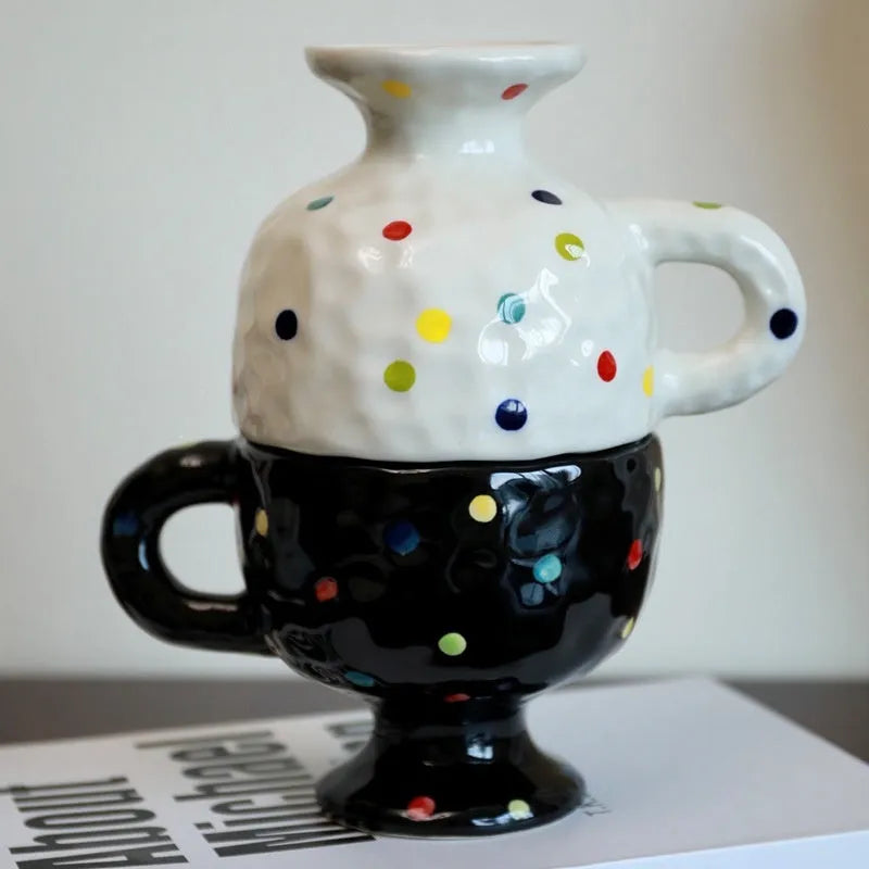 Handmade irregular solid colour ceramic mug on a table