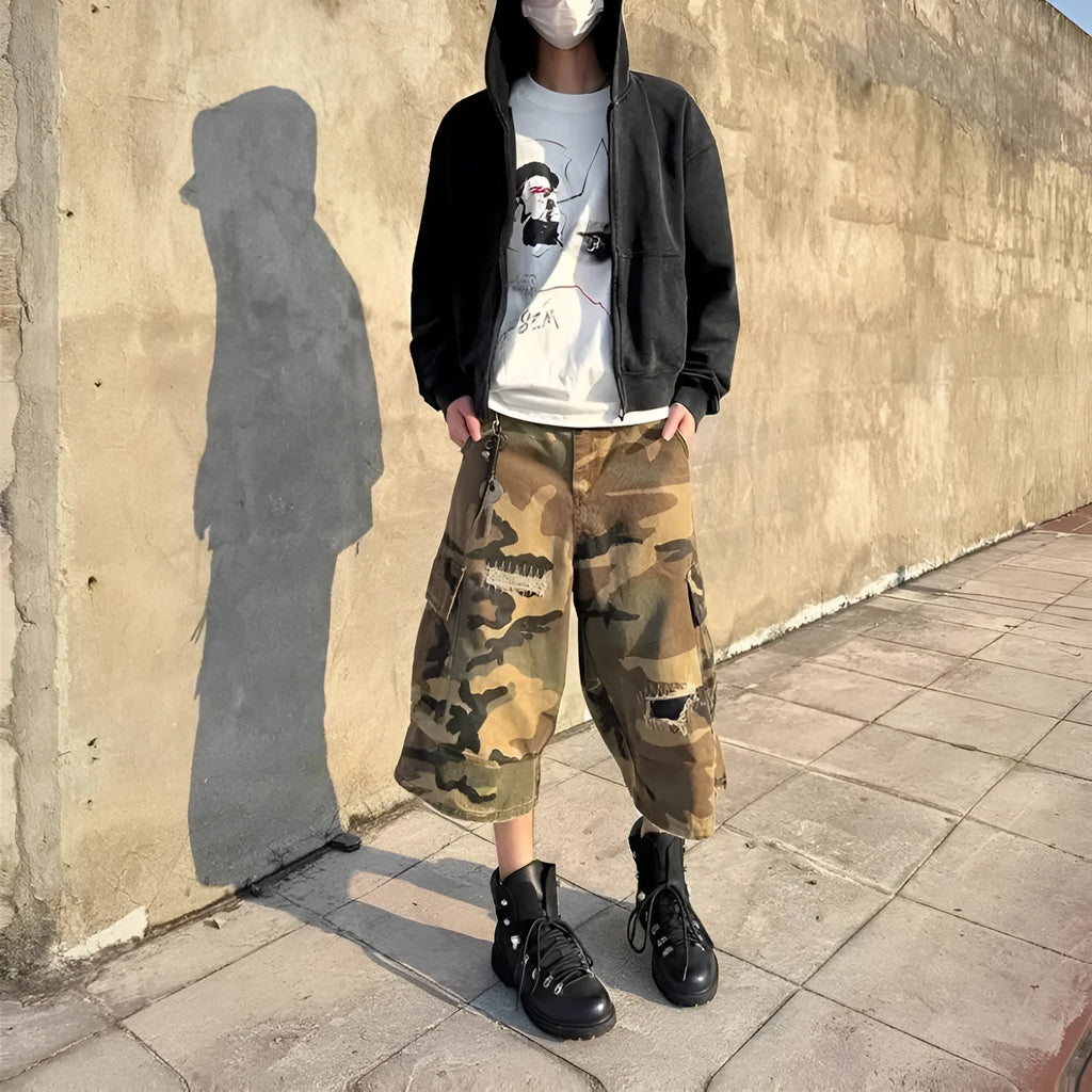 Men's retro patch ripped camouflage cropped jeans showing distressed detailing and straight leg design
