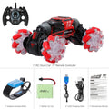 4WD RC stunt car with gesture remote control in red colour on white background showing off-road wheels and LED lights