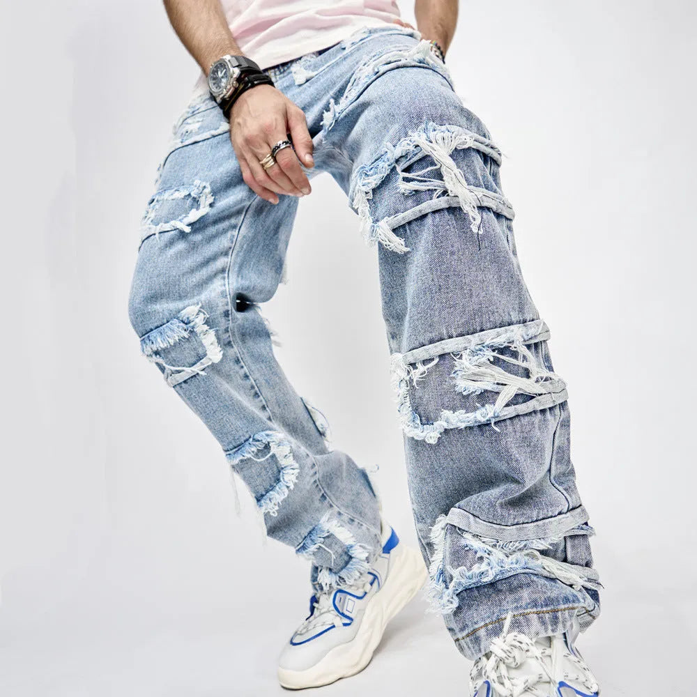 Men's blue cotton full length patched straight fit hip hop jeans on model