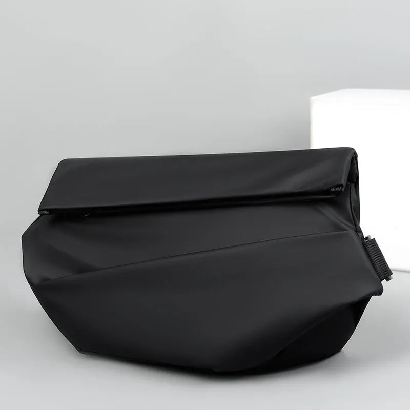 Grey men's PU leather crossbody bag showing front zipper and adjustable strap.