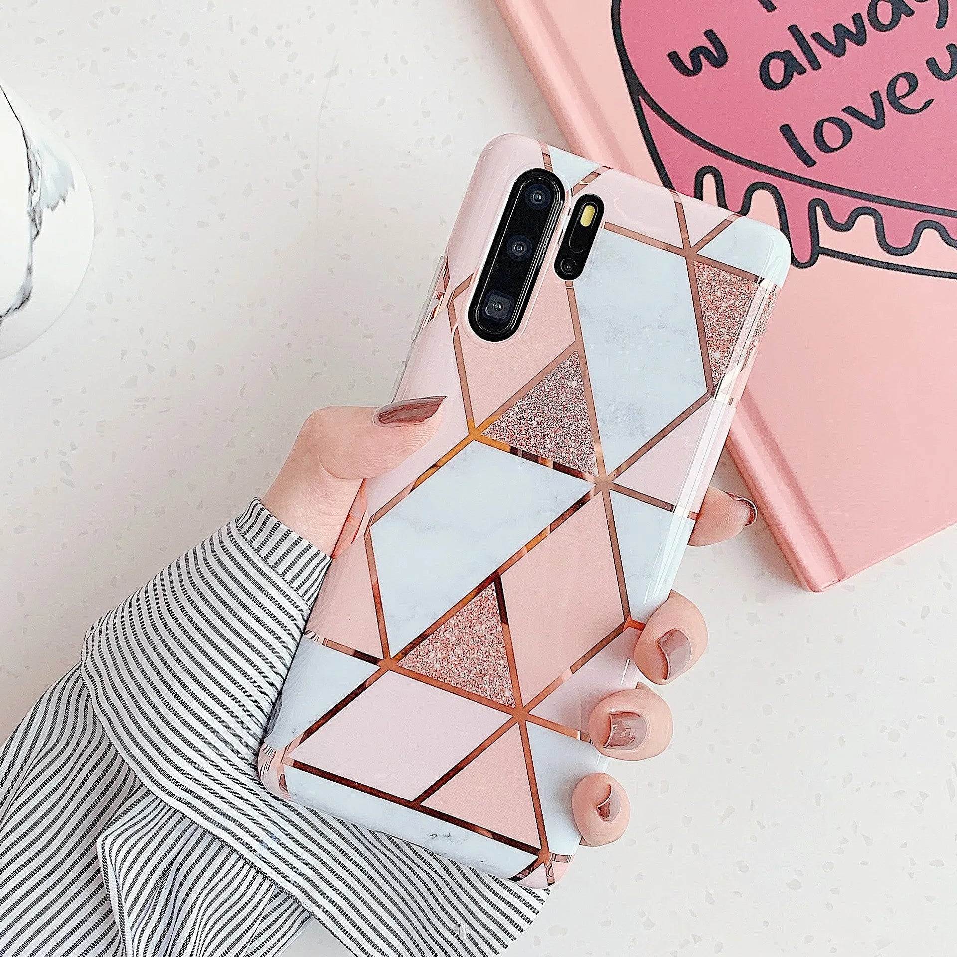 Electroplated marble design phone case for Huawei and Samsung smartphones in various colours.