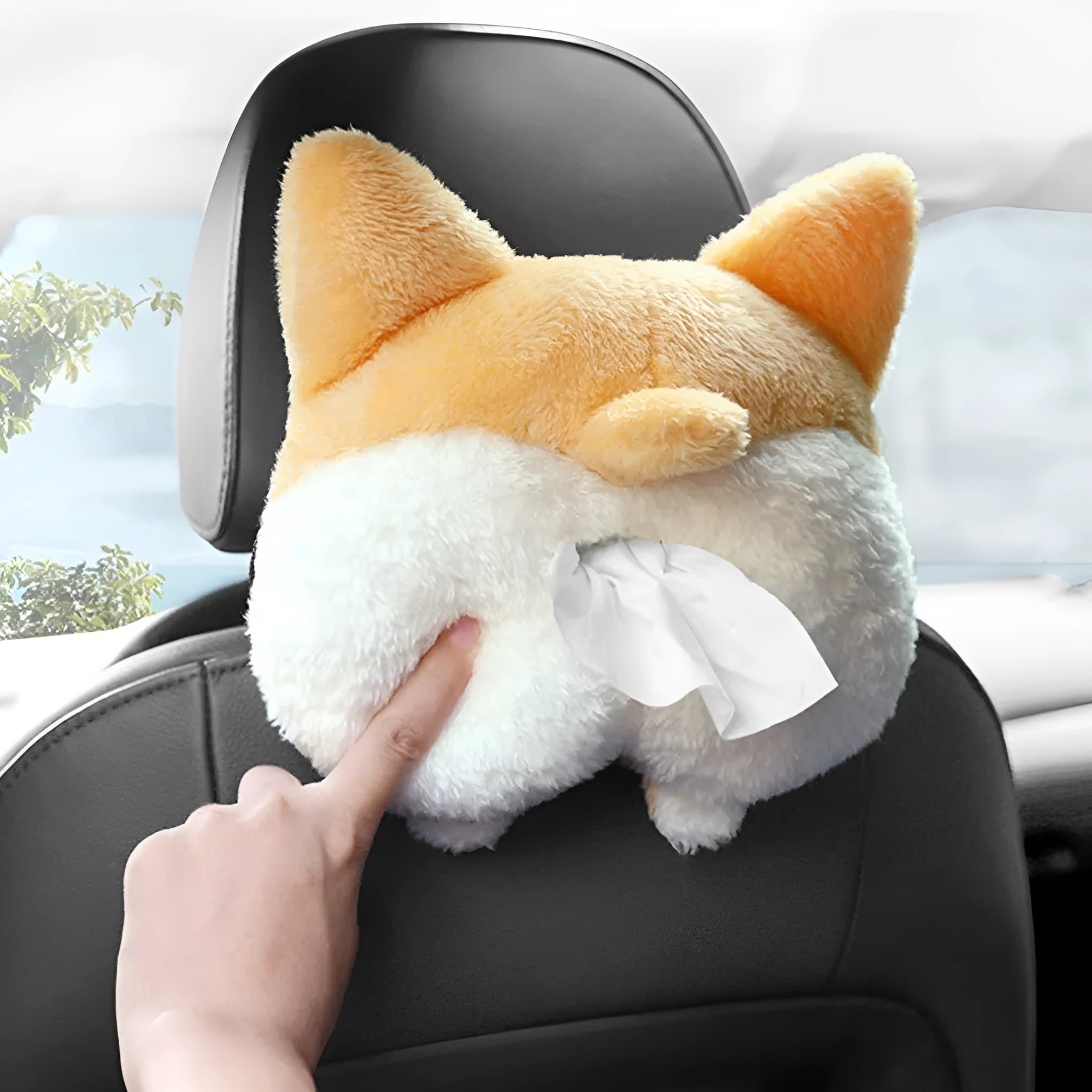 Yellow corgi butt shaped car tissue box cover with elastic strap for sun visor mounting.