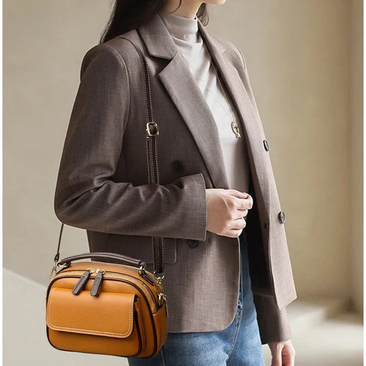 Women's black PU cross-body shoulder bag with square shape and adjustable double straps