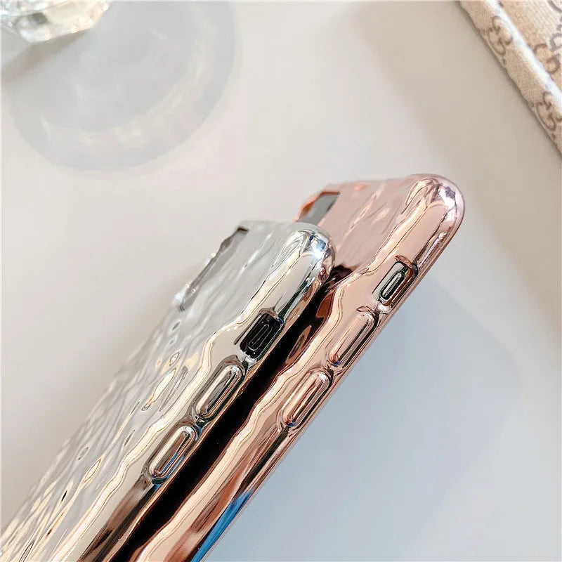 Electroplated rose gold TPU phone case for iPhone, showing precise camera and port cutouts.