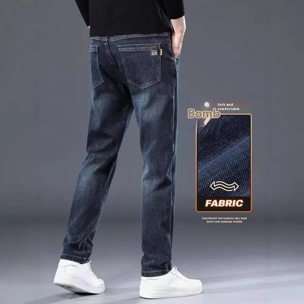 Men's slim straight casual trousers in blue grey colour showing loose fit and pencil-leg style.