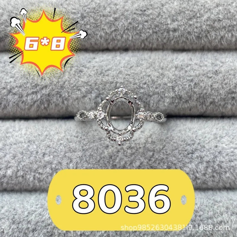 Oval denier open mouth ring with 6x8mm stone and five-pointed star on electroplated copper band.
