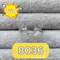 Oval denier open mouth ring with 6x8mm stone and five-pointed star on electroplated copper band.