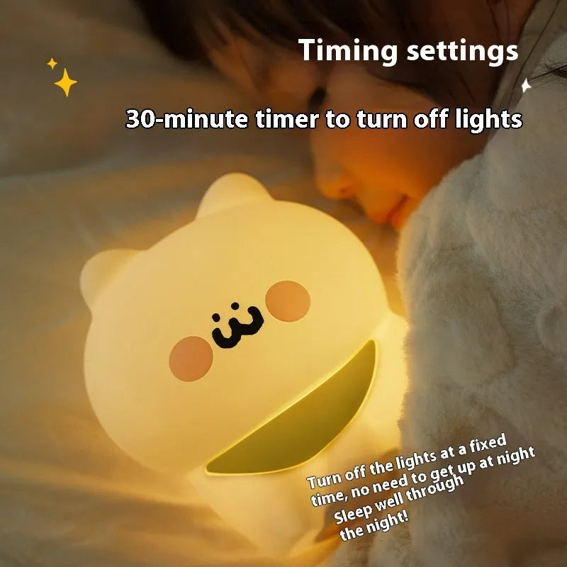 Cartoon silicone happy kitten night light with yellow light and built-in battery for bedside use