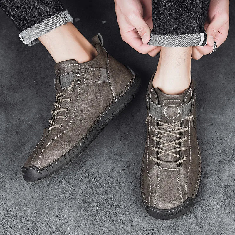 Men's casual sneakers in black with microfiber upper, rubber sole, lace-up front, and car stitching detail