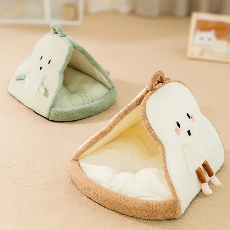 Green enclosed cat tent bed with removable blanket, shown in a large size for scale.