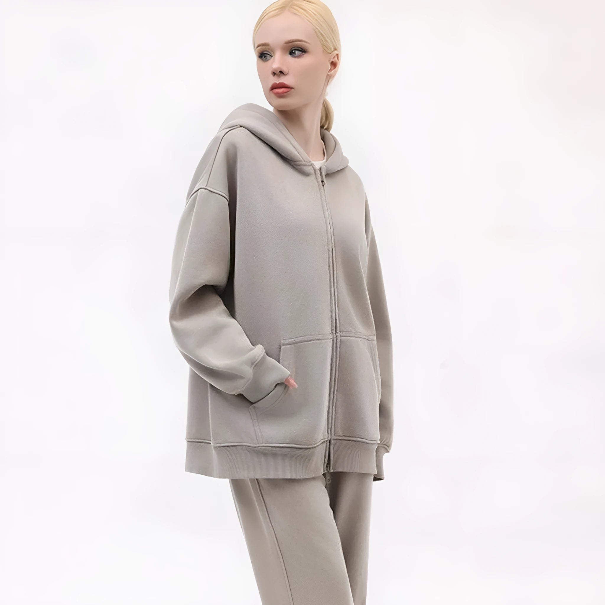 Women's distressed fleece-lined hooded cardigan sweater in loose fit with patch pockets