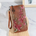 Embossed floral pattern Chinese style handbag with zipper closure in PU leather