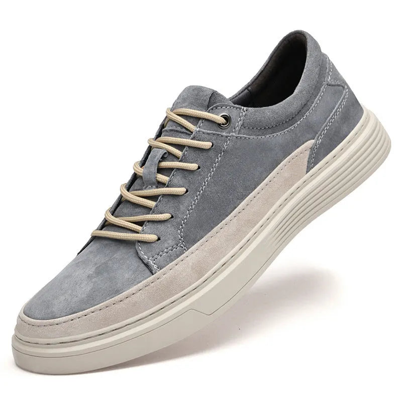 Men's grey and sand casual leather skate shoes with a round toe and rubber sole.