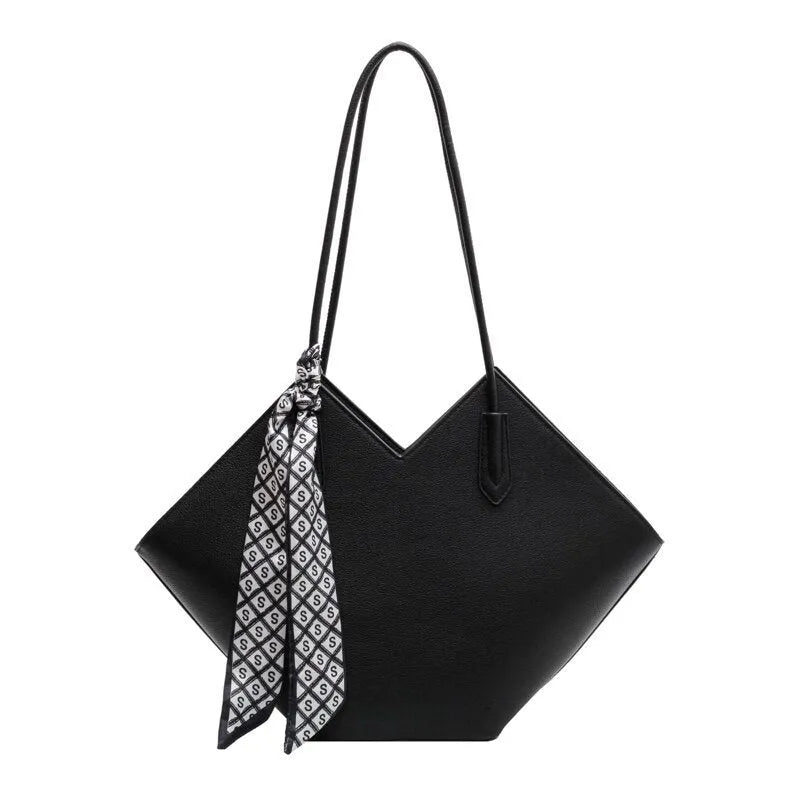 Women's large beige PU leather shoulder bag showing its horizontal square shape and front sandwich pocket.