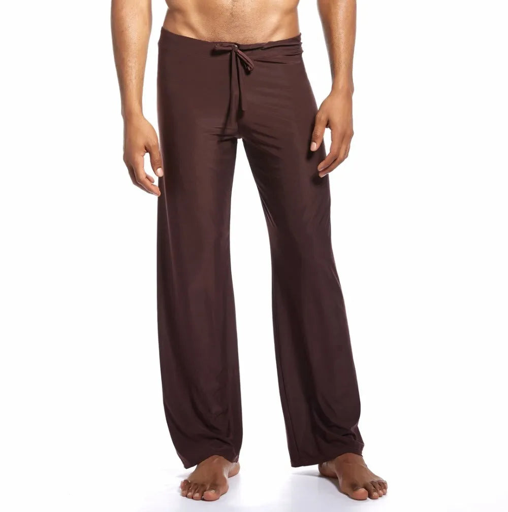 Loose fit mid waist yoga trousers for women in silky fabric, available in black, brown, grey, white