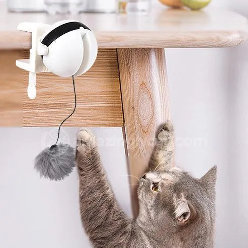White electronic motion cat toy with ABS body, rope and fur ball accessory, 7cm ball diameter