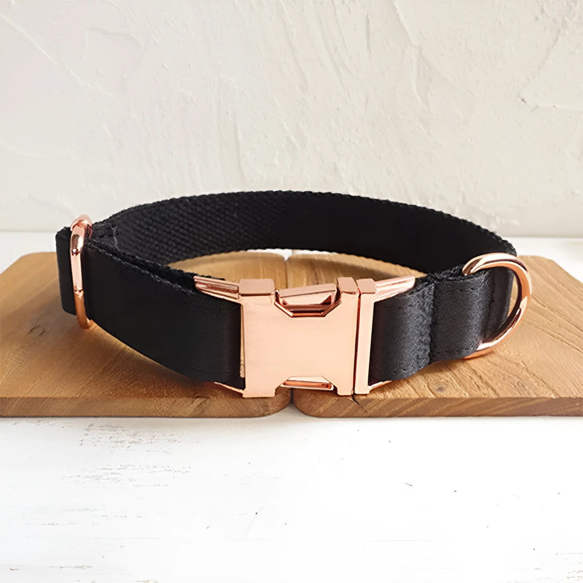 Black polyester dog collar for general use, shown as a simple pet collar available in sizes XS to XL.