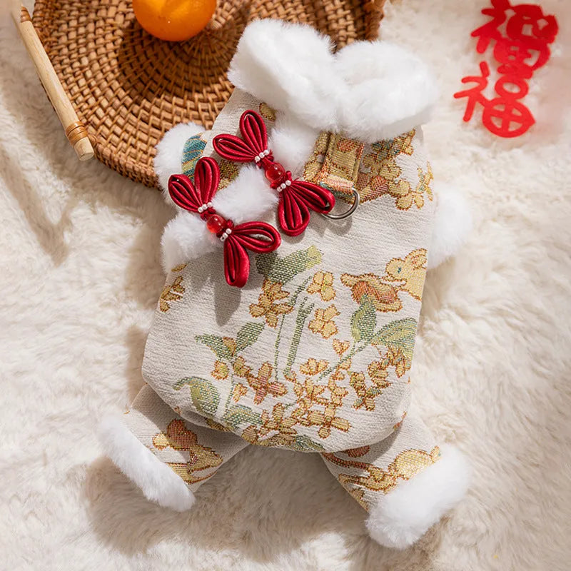 Red brocade pet jumpsuit with faux fur trim and Chinese knot buttons for Lunar New Year