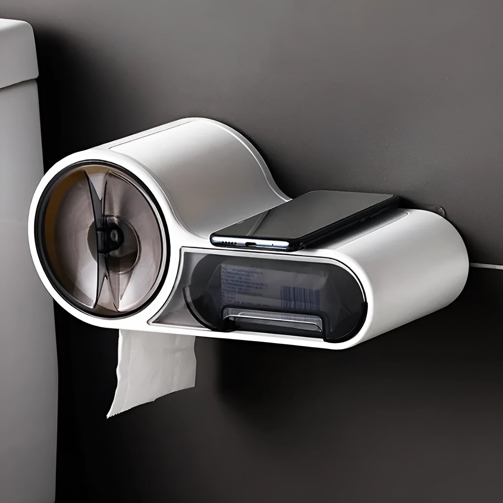 White plastic toilet roll holder with curved design on bathroom surface