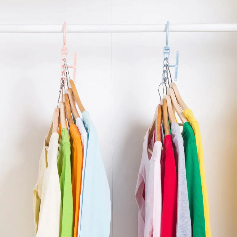Blue revolving wardrobe hanger with five rotating branches and a top handle.