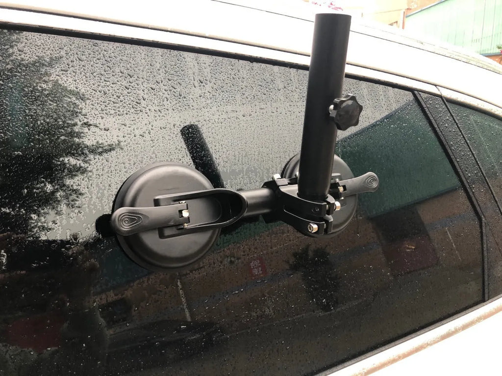 Black ABS off-road car sucker base with a round rubber sucker for mounting flagpoles on vehicle glass.