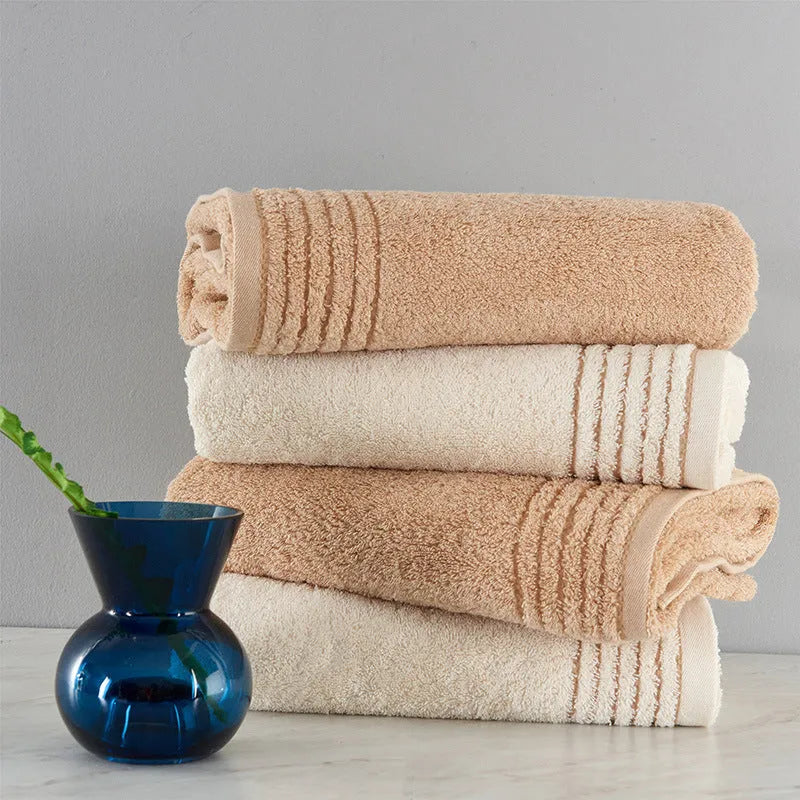 Cotton towels set showing bath, hand and guest towels in brown colour
