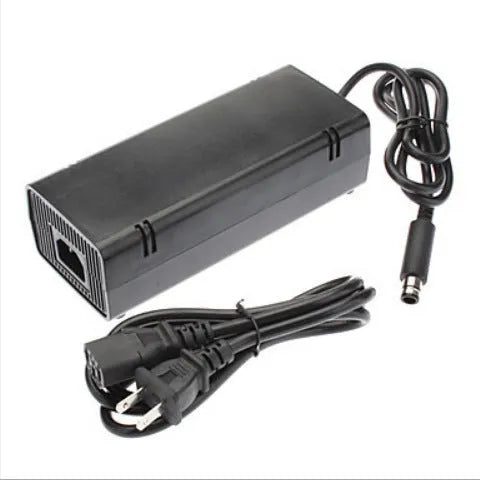 Black Xbox 360 E console AC power adapter with plug options for EU, UK, and US sockets.