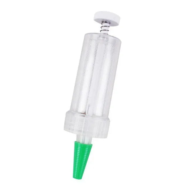 Plastic mini garden seeder tool measuring 12cm long for precise seed planting in pots