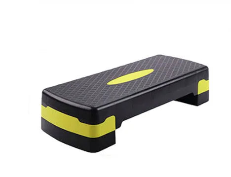 Fit step aerobics platform in grey, green, or orange, measuring 68 cm long by 28 cm wide and 15 cm high.