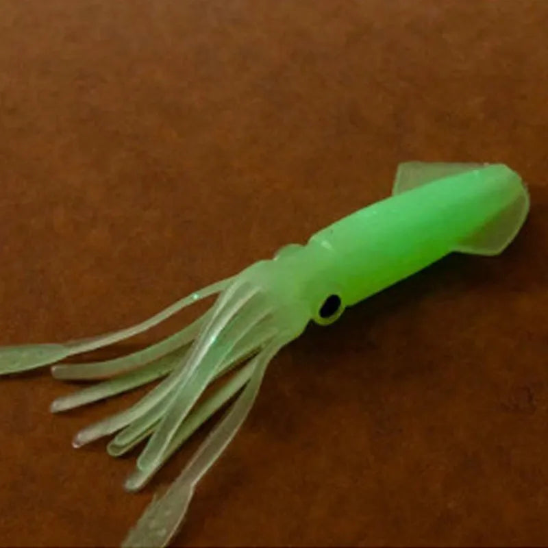 Pack of 10 luminous squid baits in light green, 105mm long, soft plastic bionic shape
