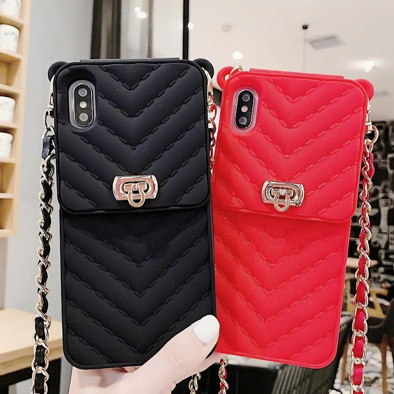 Wallet style phone case with metal chain and card holder in black, pink, red, or white for iPhone